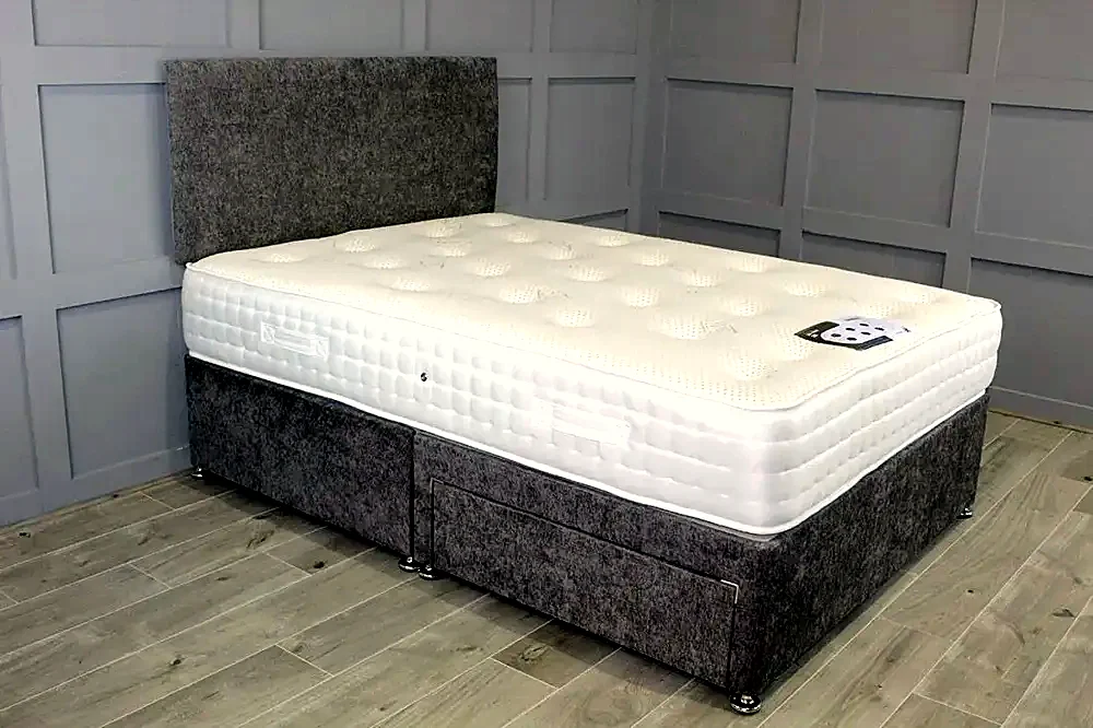 A divan bed with drawers and a mattress