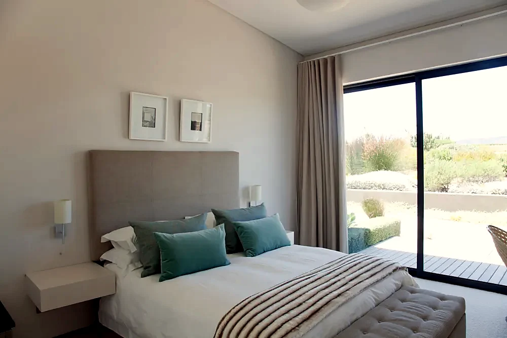 A modern bedroom with a headboard