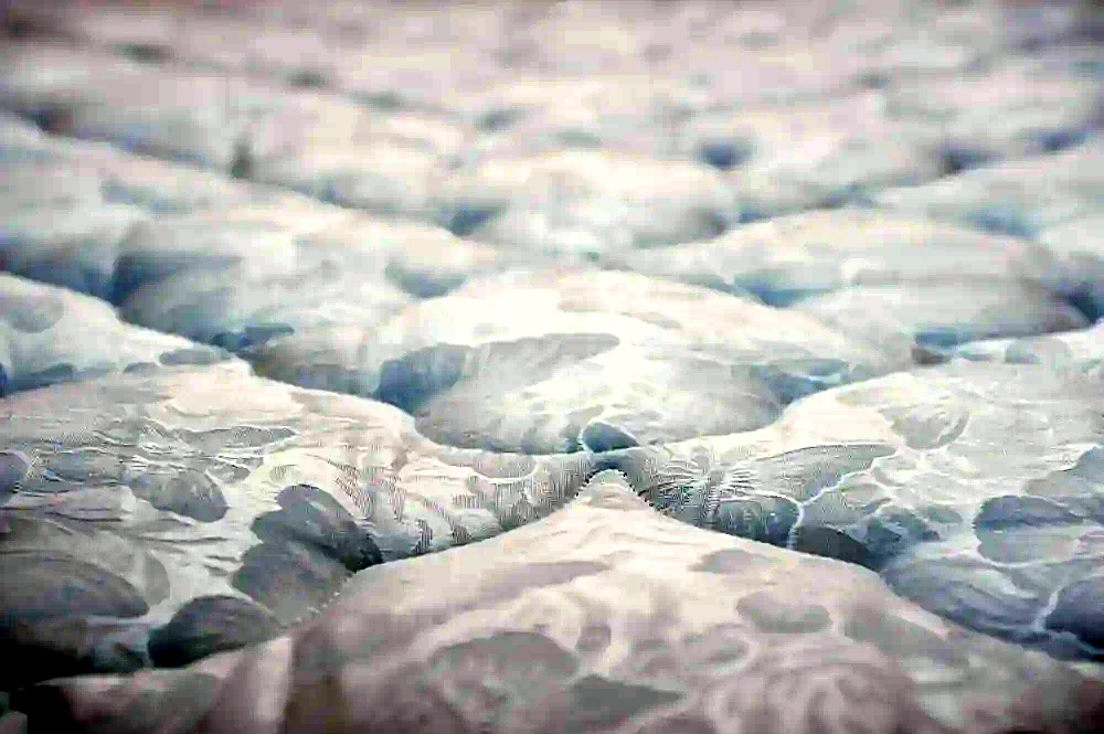 A quilted mattress surface